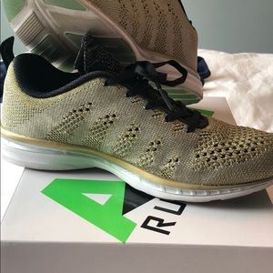 Black and Gold APL Sneakers